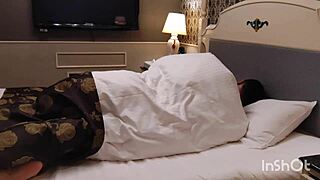 Intimate Asian Couple Shares a Passionate Moment Together