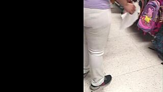 I am wearing pants and a white thong in this mexican milf crossdressing outfit