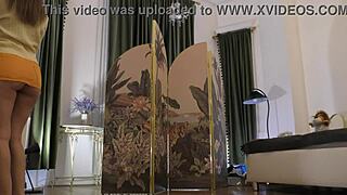 Trying on sexy lingerie and mini skirts backstage with a hot brunette babe