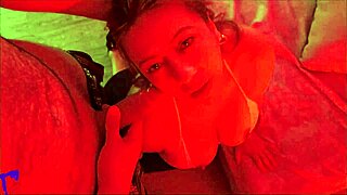 latina milf under red light sucks balls spits on dick handjob and huge facial cumshot