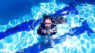 What is Jessica Bunny doing in latex underwater?