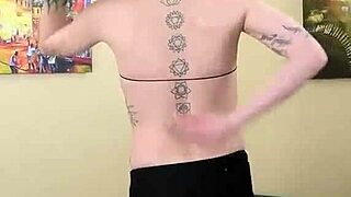 Kit Summers in black bodysuit and gothic miniskirt