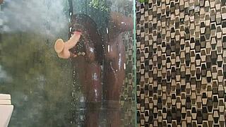 Ebony milf tries new toy in shower
