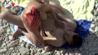 Tanned slut gets it from behind on the beach
