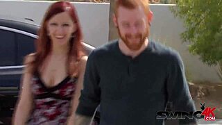 Redhead couple enjoys pool time before partying with others