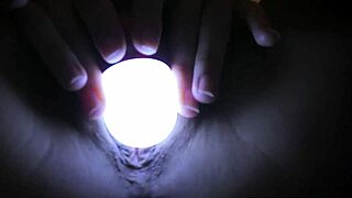 Girl could not sleep, so she began to stimulate herself with a flashlight in her hand
