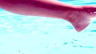 Girls rimming sensually poolside