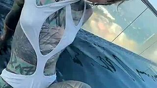 Bikini model lounges by the pool on Pattaya's rooftops