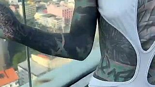 Bikini model lounges by the pool on Pattaya's rooftops