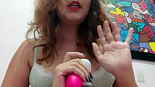 Naughty Brazilian woman answers questions while showing her favorite sex toy.