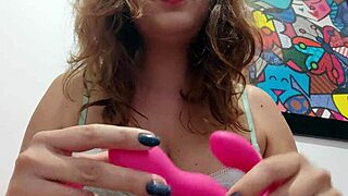 Naughty Brazilian woman answers questions while showing her favorite sex toy.