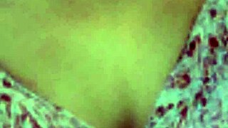 Mature Model Strolls Along The Beach