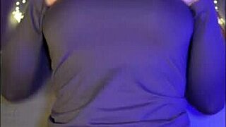 uh, a redhead with blue eyes, ridin a dildo so passionate in a net, playin with cum, ya see?