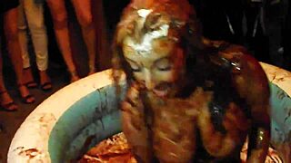 King narrates the wild chocolate wrestling olympics movie with intense poolside action.