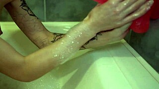sexy bitch passionately masturbates huge rubber cock wet vagina in the bathroom on camera?