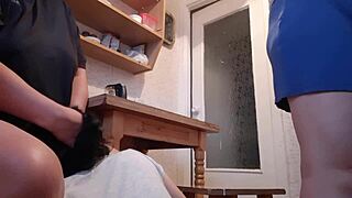 While the housekeeper washed dishes, my girlfriend licked pussy under the table riskily