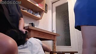 While the housekeeper washed dishes, my girlfriend licked pussy under the table riskily