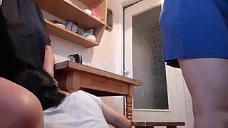 While the housekeeper washed dishes, my girlfriend licked pussy under the table riskily