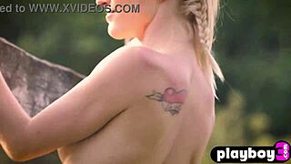 Stunning blonde model Zazie Passion poses outdoors with her small tits.