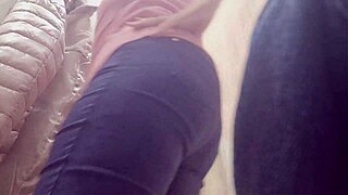 Confident 40-Year-Old Woman Enjoys Trying On Tight Jeans In Stores