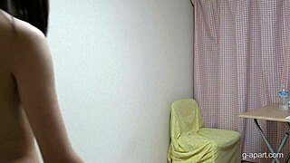 naked japanese girl with nice tits starts to get dressed