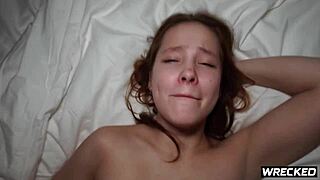 Why is the redhead teen getting fucked by two guys?