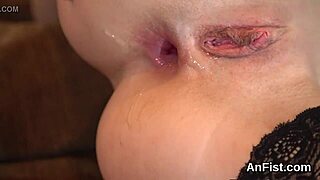 These frisky lesbian lookers spread wide and fist fuck each other's butt holes.