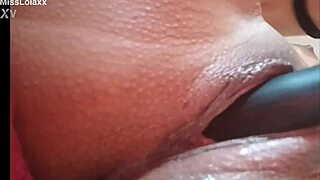 sensual latina masturbating with dildo in bed