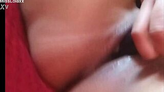 sensual latina masturbating with dildo in bed