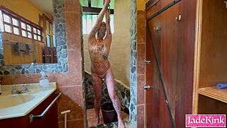 Sub slut endures rough bathroom punishment with foam spray