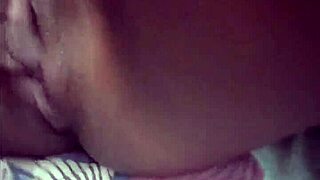 black girl sensually touched by white man, showing off her black pussy