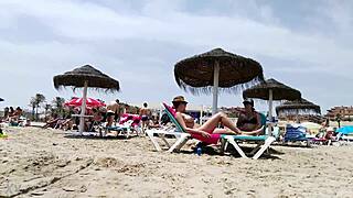 Brunette's Massive Tits Tease Beachgoers in Steamy Sequel