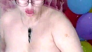 mature bitch dildos juicy pussy amid colorful balloons