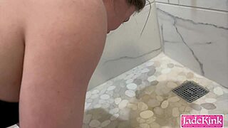 peeing on my slutty girlfriend in bathroom makin her lick piss off floor
