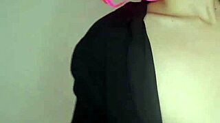 next door housewife in kitty mask and corset flashes natural big tits with toys on bed