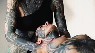Tattooed skin glows during intense massage session