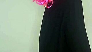 next door housewife in kitty mask and corset flashes natural big tits with toys on bed