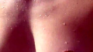 cute girl with amazing body relaxes in shower after gym workout