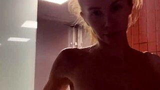 cute girl with amazing body relaxes in shower after gym workout