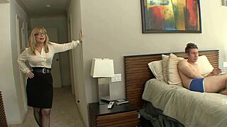 Nina Hartley seduces college stud craving her tight hole for huge dick