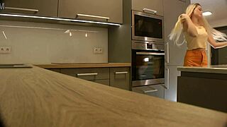 check out this long-legged blonde coed's miniskirt barely hiding ass in heels 🔥 kitchen tease!