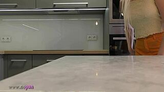 check out this long-legged blonde coed's miniskirt barely hiding ass in heels 🔥 kitchen tease!