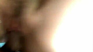 beautiful girl mounts in reverse cowgirl, passionately riding her man's cock with deep moans and licks