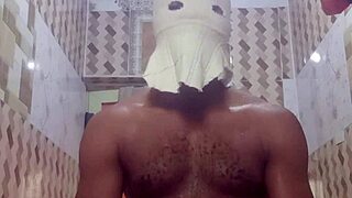 A young woman indulges in erotic solo masturbation in the bathroom.