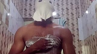 A young woman indulges in erotic solo masturbation in the bathroom.