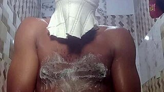 A young woman indulges in erotic solo masturbation in the bathroom.