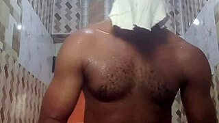 A young woman indulges in erotic solo masturbation in the bathroom.