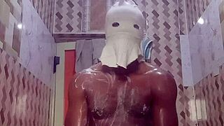 A young woman indulges in erotic solo masturbation in the bathroom.