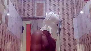 A young woman indulges in erotic solo masturbation in the bathroom.