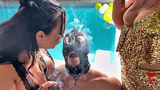 Watch This Latina Lesbian Smoke and Blow in Big Tits Friend's Face